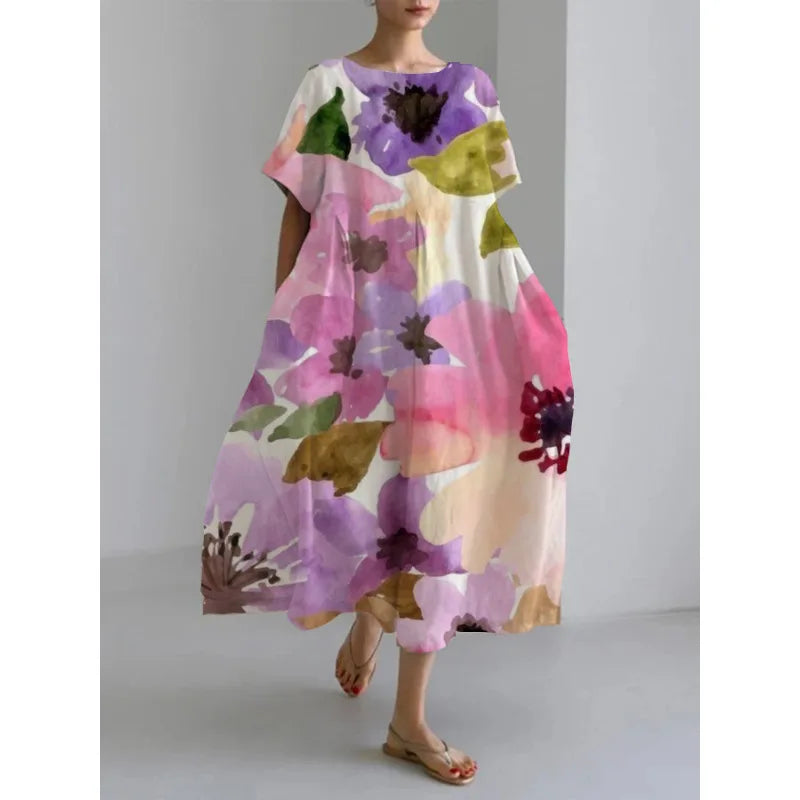 Jasmina – Robe légère d’été au motif floral délicat.