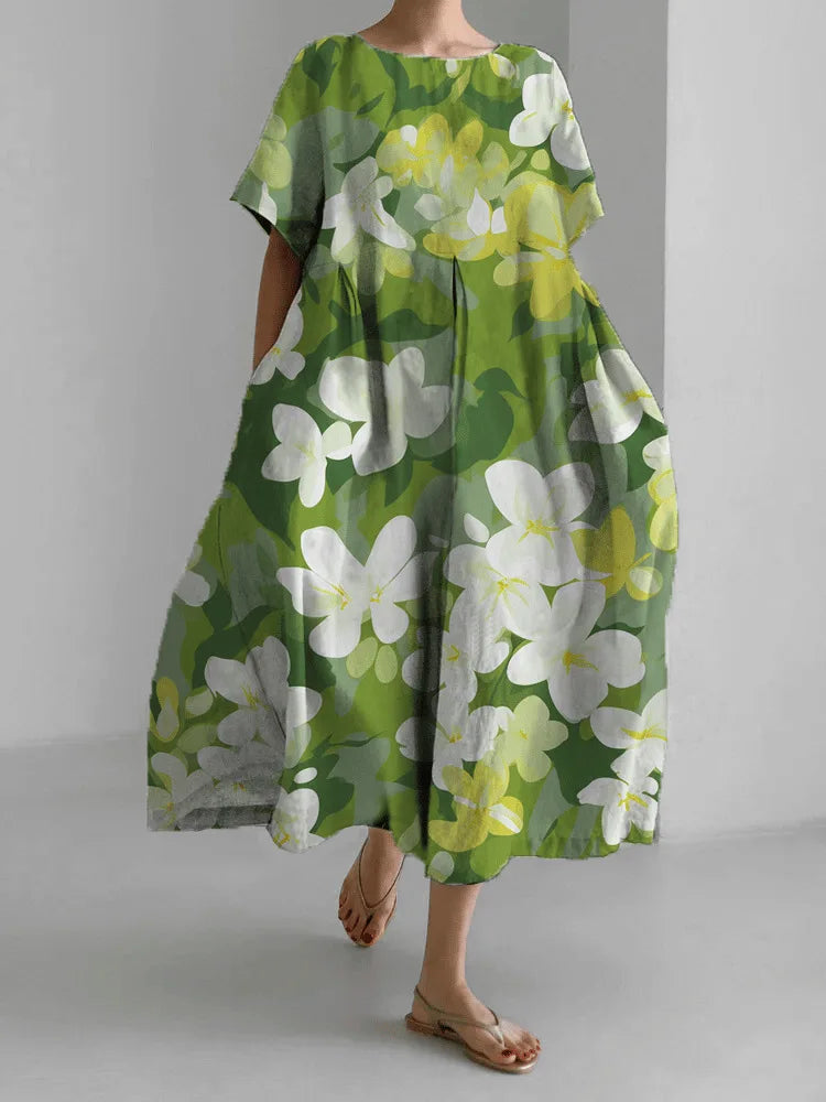 Jasmina – Robe légère d’été au motif floral délicat.