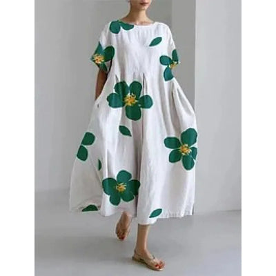 Jasmina – Robe légère d’été au motif floral délicat.