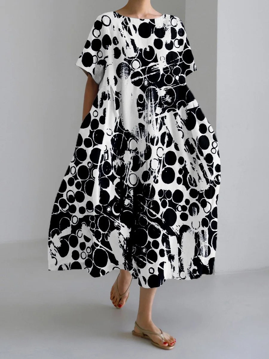 Jasmina – Robe légère d’été au motif floral délicat.