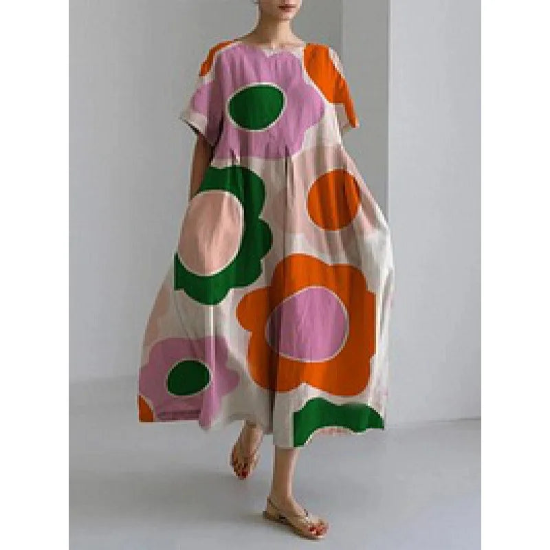 Jasmina – Robe légère d’été au motif floral délicat.