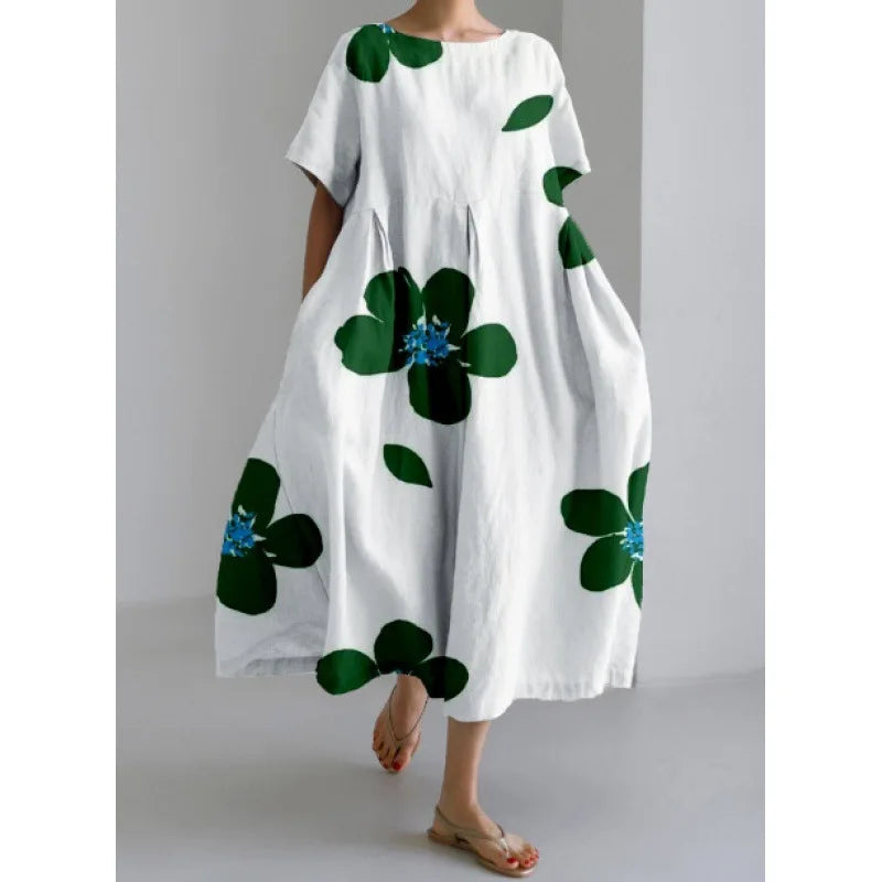 Jasmina – Robe légère d’été au motif floral délicat.