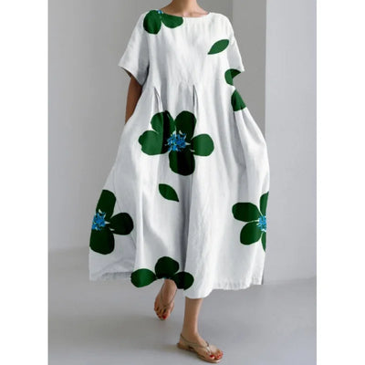 Jasmina – Robe légère d’été au motif floral délicat.