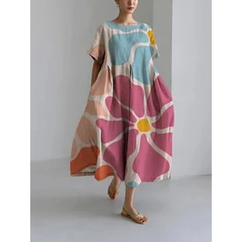 Jasmina – Robe légère d’été au motif floral délicat.
