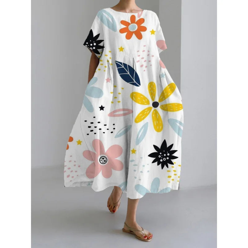 Jasmina – Robe légère d’été au motif floral délicat.