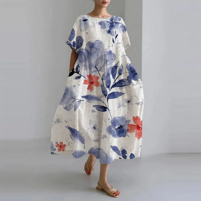 Jasmina – Robe légère d’été au motif floral délicat.