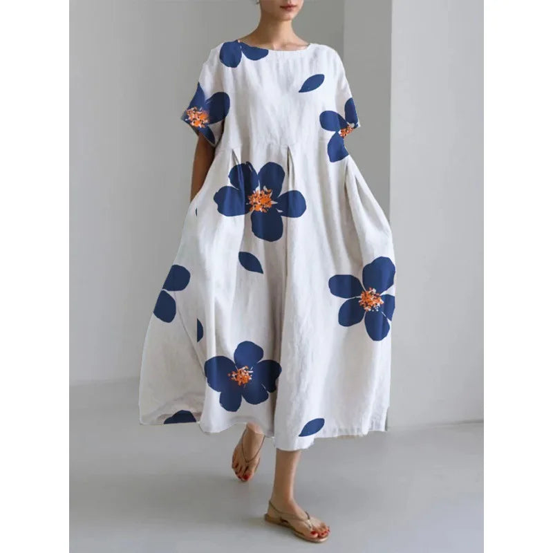 Jasmina – Robe légère d’été au motif floral délicat.