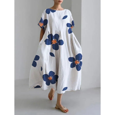 Jasmina – Robe légère d’été au motif floral délicat.