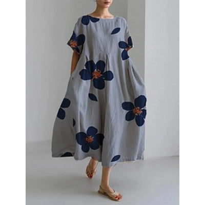 Jasmina – Robe légère d’été au motif floral délicat.