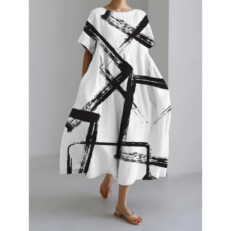 Jasmina – Robe légère d’été au motif floral délicat.