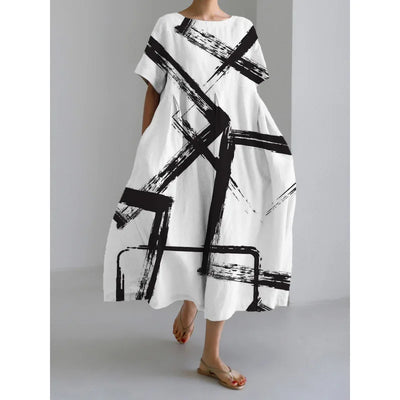 Jasmina – Robe légère d’été au motif floral délicat.